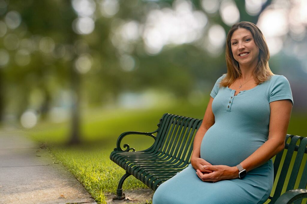 pregnant woman on bench